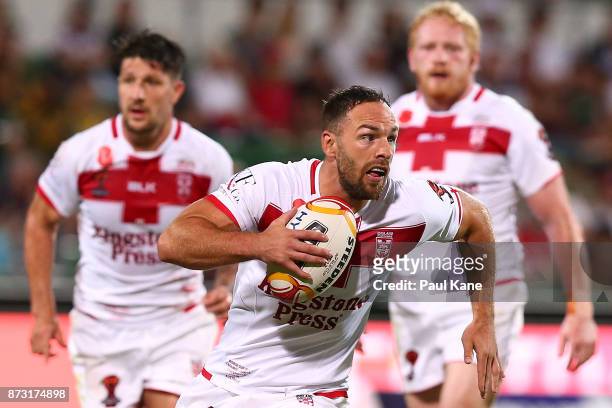 Luke Gale of England runs the ball during the 2017 Rugby League World Cup match between England and France at nib Stadium on November 12, 2017 in...