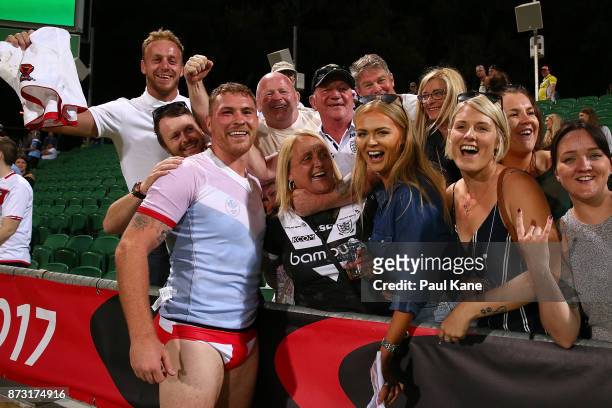 Scott Taylor of England celebrates with spectators after winning the 2017 Rugby League World Cup match between England and France at nib Stadium on...