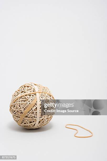 rubber band ball - elastic band ball stock pictures, royalty-free photos & images