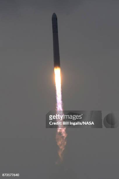 In this handout provided by the National Aeronautics and Space Administration , The Orbital ATK Antares rocket, with the Cygnus spacecraft onboard,...
