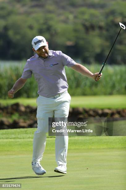 Branden Grace of South Africa celebrates a birdie on the 16th green during the final round of the Nedbank Golf Challenge at Gary Player CC on...