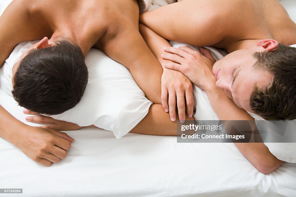 A gay couple sleeping