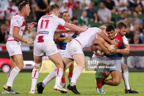 Fouad Yaha of France is tackled during the 2017 Rugby League World Cup match between England and France at nib Stadium on November 12, 2017 in Perth,...