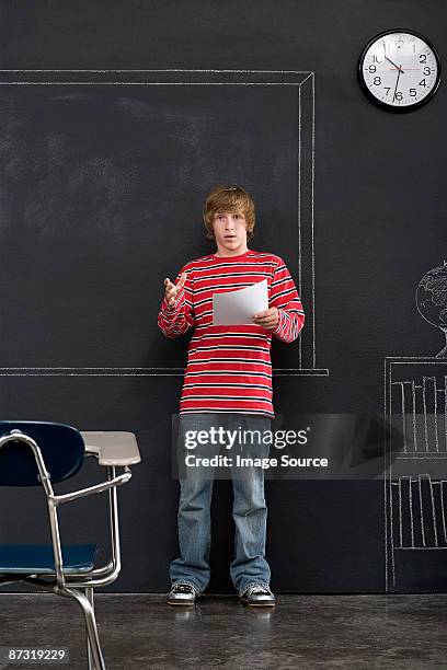 a boy giving a presentation - boy in briefs stock pictures, royalty-free photos & images