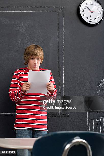 a boy giving a presentation - only boys stock pictures, royalty-free photos & images