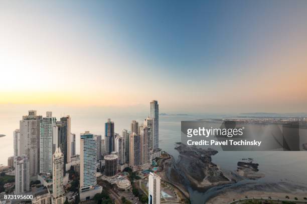 punta paitilla skyline at sunrise, the panama city's prime real estate district - tax haven stock pictures, royalty-free photos & images