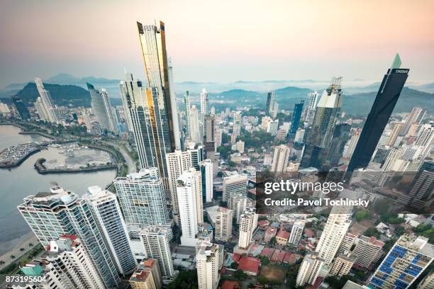 skyscrapers along avenida balboa in panama city at sunrise - latin america stock pictures, royalty-free photos & images