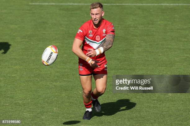 Courtney Davies of Wales passes the ball during the 2017 Rugby League World Cup match between Wales and Ireland at nib Stadium on November 12, 2017...