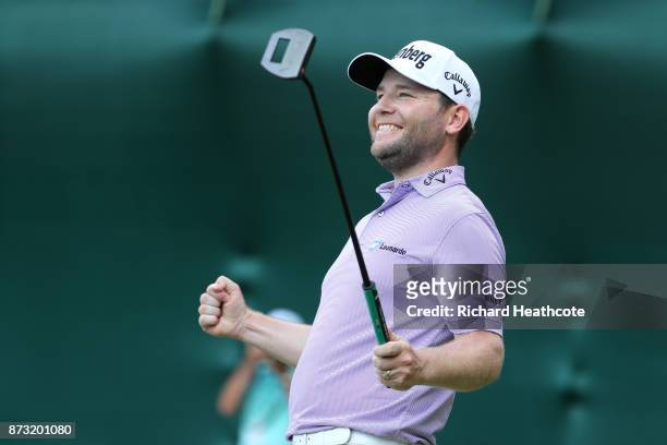 Branden Grace of South Africa celebrates his victory on the 18th green during the final round of the Nedbank Golf Challenge at Gary Player CC on...
