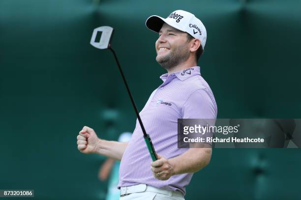 Branden Grace of South Africa celebrates his victory on the 18th green during the final round of the Nedbank Golf Challenge at Gary Player CC on...