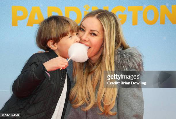 Xenia Seeberg and son Philip-Elias Martinek attend the 'Paddington 2' premiere at Zoo Palast on November 12, 2017 in Berlin, Germany.