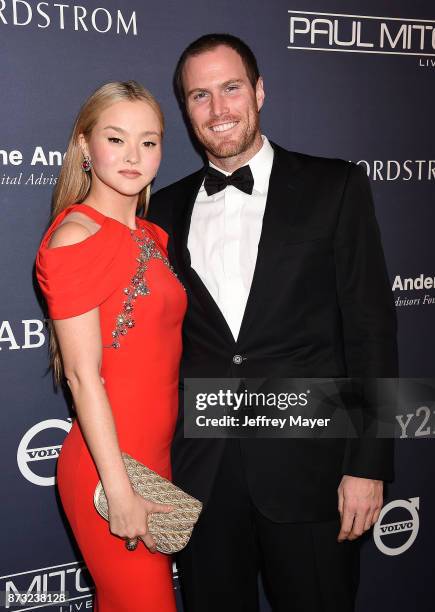 Actress/model Devon Aoki and James Bailey attend the 2017 Baby2Baby Gala at 3Labs on November 11, 2017 in Culver City, California.