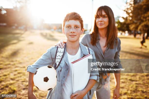 teenager go to school with mom - soccer mum stock pictures, royalty-free photos & images