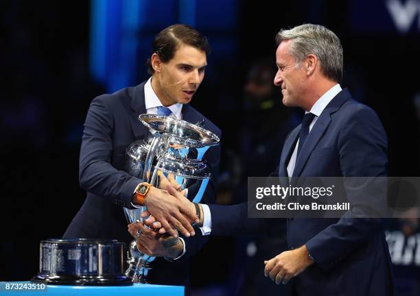 Rafael Nadal of Spain receives the Emirates ATP year end World Number One trophy from ATP CEO Chris Kermode after a presentation to him on the first...