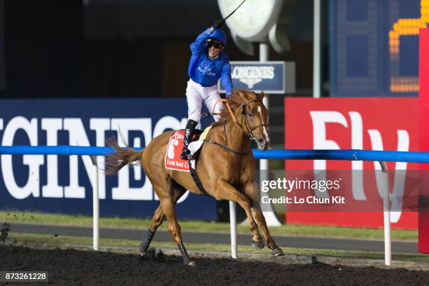 Jockey Silvestre De Sousa riding African Story wins the Dubai World Cup at the Meydan racecourse on March 29, 2014 in Dubai, United Arab Emirates.