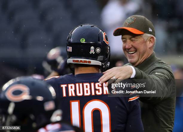 Quarterback Mitchell Trubisky and head coach John Fox of the Chicago Bears talk during warm-ups prior to the game against the Green Bay Packers at...