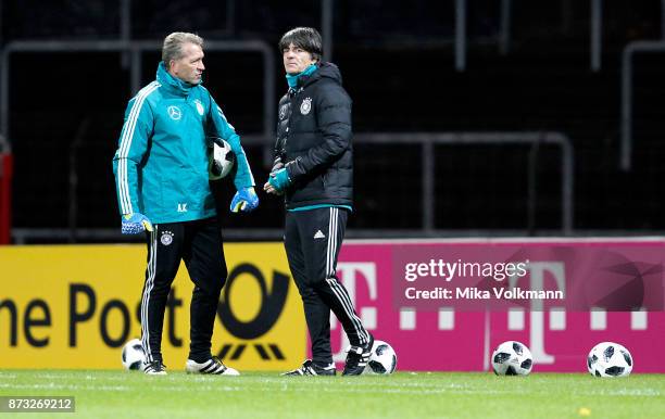 Head coach Joachim Loew of Germany in discussion with goalkeeper coach Andreas Kopke of Germany during the training of the german national team on...