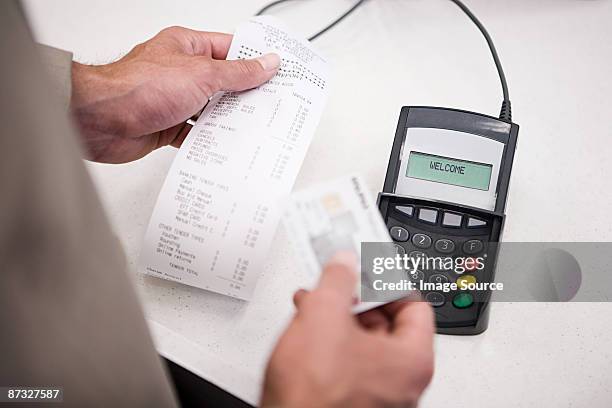Computer Hand Receipt Hand Holding Receipt Photos and Premium High Res Pictures - Getty Images