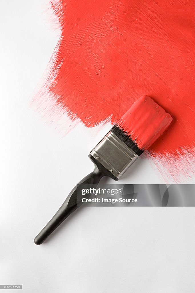 A paintbrush and painted brush stroke