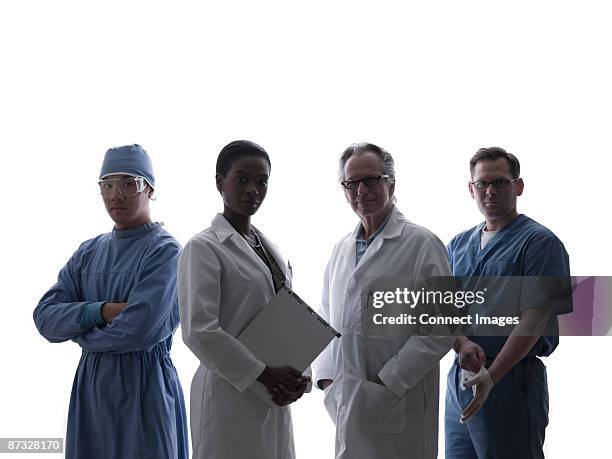 doctors and surgeons - four people white background stock pictures, royalty-free photos & images