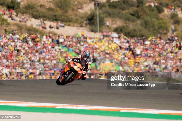 Brad Binder of South Africa and Red Bull KTM Ajo heads down a straight during the Moto2 race during the Comunitat Valenciana Grand Prix - Moto GP at...