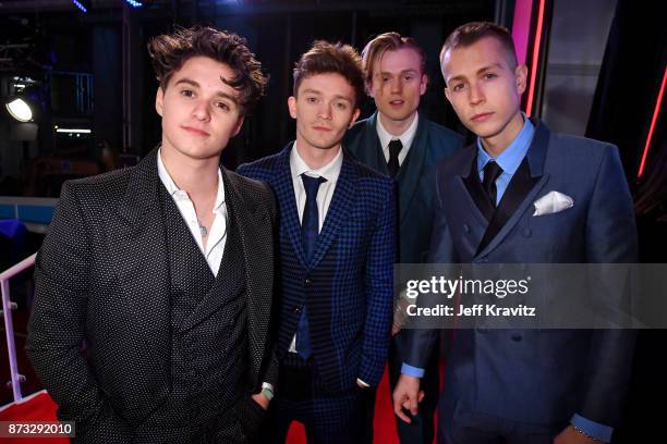 Bradley Simpson, Connor Ball, Tristan Evans and James McVey of The Vamps attend the MTV EMAs 2017 held at The SSE Arena, Wembley on November 12, 2017...