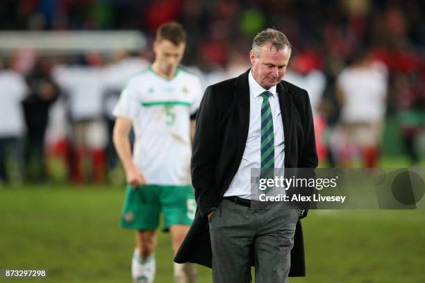 Michael O'Neill, Manager of Northern Ireland looks dejected following the FIFA 2018 World Cup Qualifier Play-Off: Second Leg between Switzerland and...