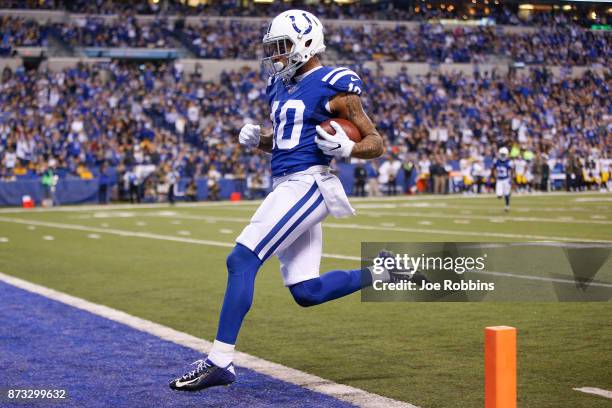 Donte Moncrief of the Indianapolis Colts runs into the endzone for a touchdown against the Pittsburgh Steelers during the second quarter at Lucas Oil...