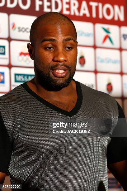 French judoka Teddy Riner answers journalists questions after his victory in the Judo World Championships Open in Marrakesh on November 12, 2017. -...