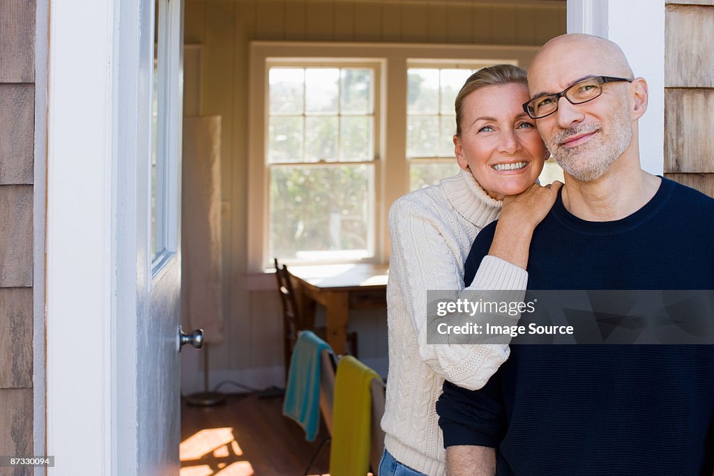 Couple outside house