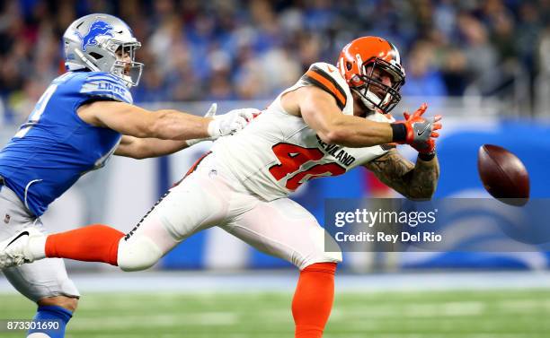 Nick Bellore of the Detroit Lions breaks up a pass intended for Danny Vitale of the Cleveland Browns during the first half at Ford Field on November...
