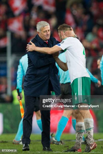 Switzerlands Head Coach Vladimir Petkovic embraces Northern Irelands Gareth McAuley after the FIFA 2018 World Cup Qualifier Play-Off: Second Leg...