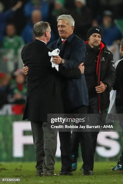 Michael ONeill head coach / manager of Northern Ireland and Vladimir Petkovic head coach / manager of Switzerland at full time during the FIFA 2018...