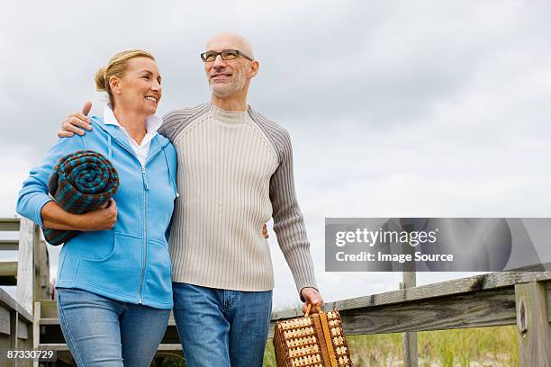 couple going for picnic - romance cover stock pictures, royalty-free photos & images