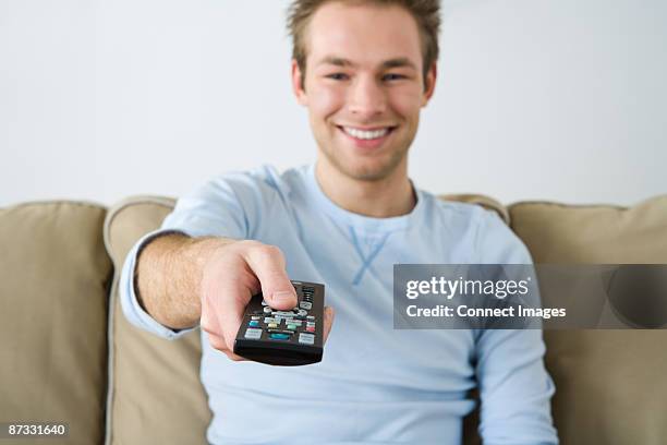Man Remote Control 781 Man Pointing Remote Control Stock Photos, High-Res Pictures, and ...
