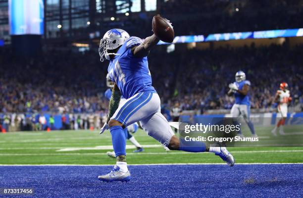 Nevin Lawson of the Detroit Lions recovers a fumble and runs it back for a touchdown against the Cleveland Browns during the second quarter at Ford...