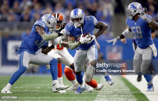 Nevin Lawson of the Detroit Lions recovers a fumble and runs it back for a touchdown against the Cleveland Browns during the second quarter at Ford...