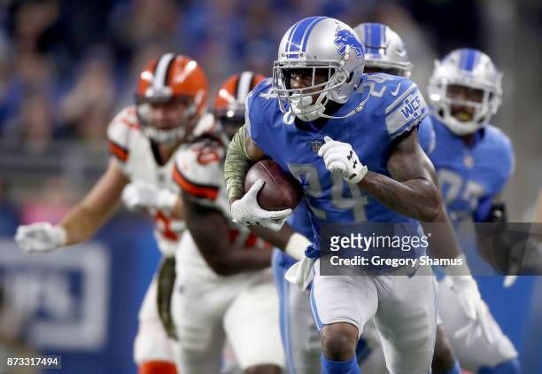 Nevin Lawson of the Detroit Lions recovers a fumble and runs it back for a touchdown against the Cleveland Browns during the second quarter at Ford...