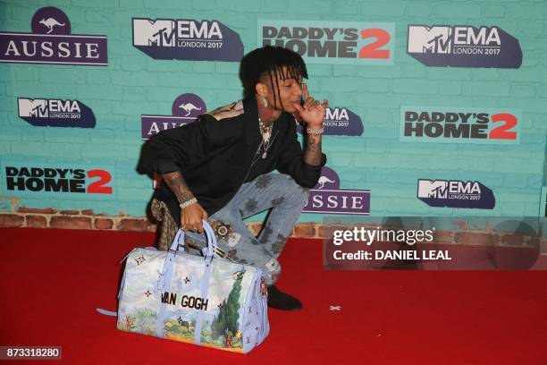 Hip-hop artist Swae Lee poses on the red carpet arriving to attend the 2017 MTV Europe Music Awards at Wembley Arena in London on November 12, 2017.