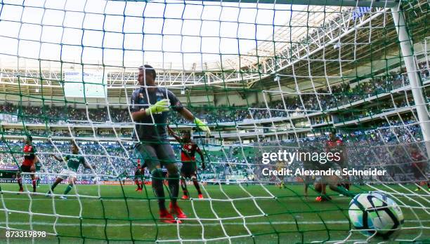 Deyverson of Palmeiras scores their second goal during the match between Palmeiras and Flamengo for the Brasileirao Series A 2017 at Allianz Parque...