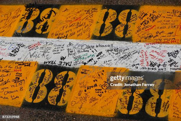 Fans sign the for Dale Earnhardt Jr., driver of the Nationwide Chevrolet, during the Monster Energy NASCAR Cup Series Can-Am 500 at Phoenix...