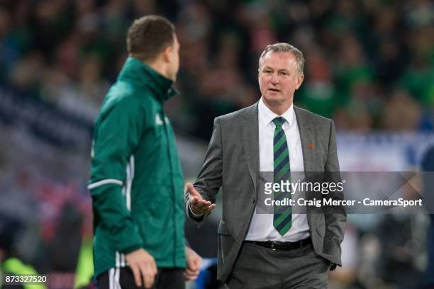 Northern Ireland's Manager Michael O'Neill questions the fourth official during the FIFA 2018 World Cup Qualifier Play-Off: Second Leg between...