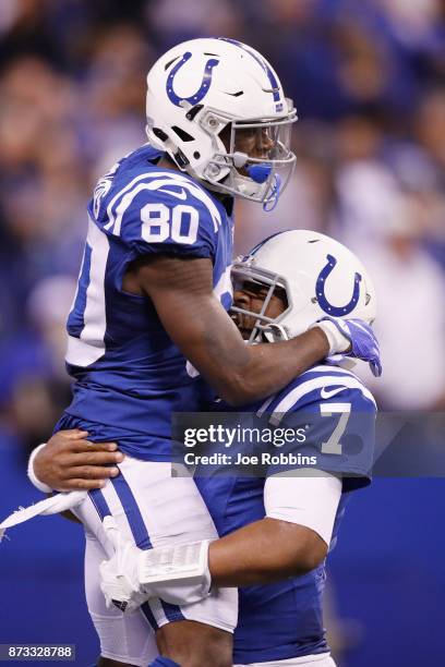 Chester Rogers of the Indianapolis Colts celebrates with Jacoby Brissett after a touchdown against the Pittsburgh Steelers during the second half at...