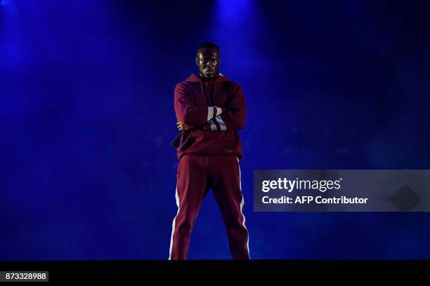 British grime and hip hop artist Stormzy performs during the 2017 MTV Europe Music Awards at Wembley Arena in London on November 12, 2017. / AFP...