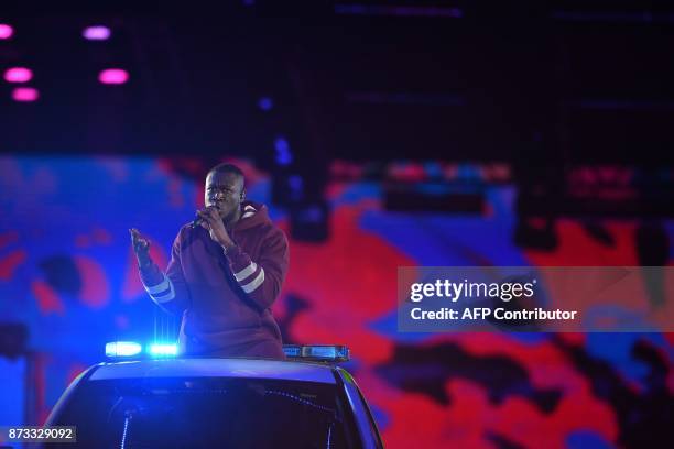 British grime and hip hop artist Stormzy performs during the 2017 MTV Europe Music Awards at Wembley Arena in London on November 12, 2017. / AFP...