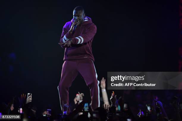 British grime and hip hop artist Stormzy performs during the 2017 MTV Europe Music Awards at Wembley Arena in London on November 12, 2017. / AFP...