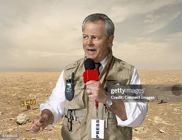 news presenter in war zone - newsreader stock pictures, royalty-free photos & images