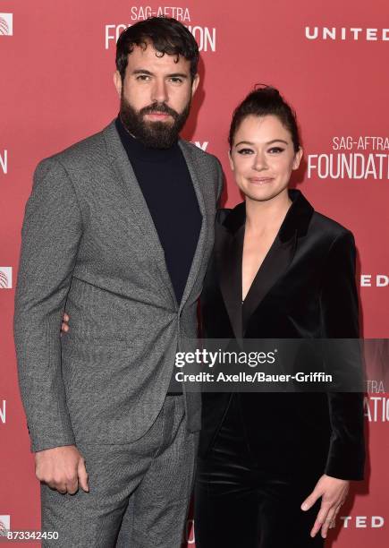 Actors Tom Cullen and Tatiana Maslany arrive at SAG-AFTRA Foundation Patron of the Artists Awards 2017 on November 9, 2017 in Beverly Hills,...