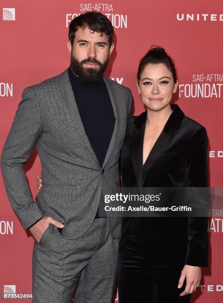 Actors Tom Cullen and Tatiana Maslany arrive at SAG-AFTRA Foundation Patron of the Artists Awards 2017 on November 9, 2017 in Beverly Hills,...