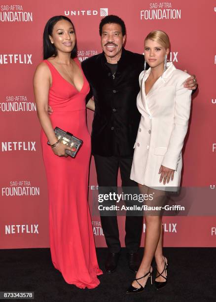 Lisa Parigi, singer Lionel Richie and daughter Sofia Richie arrive at SAG-AFTRA Foundation Patron of the Artists Awards 2017 on November 9, 2017 in...